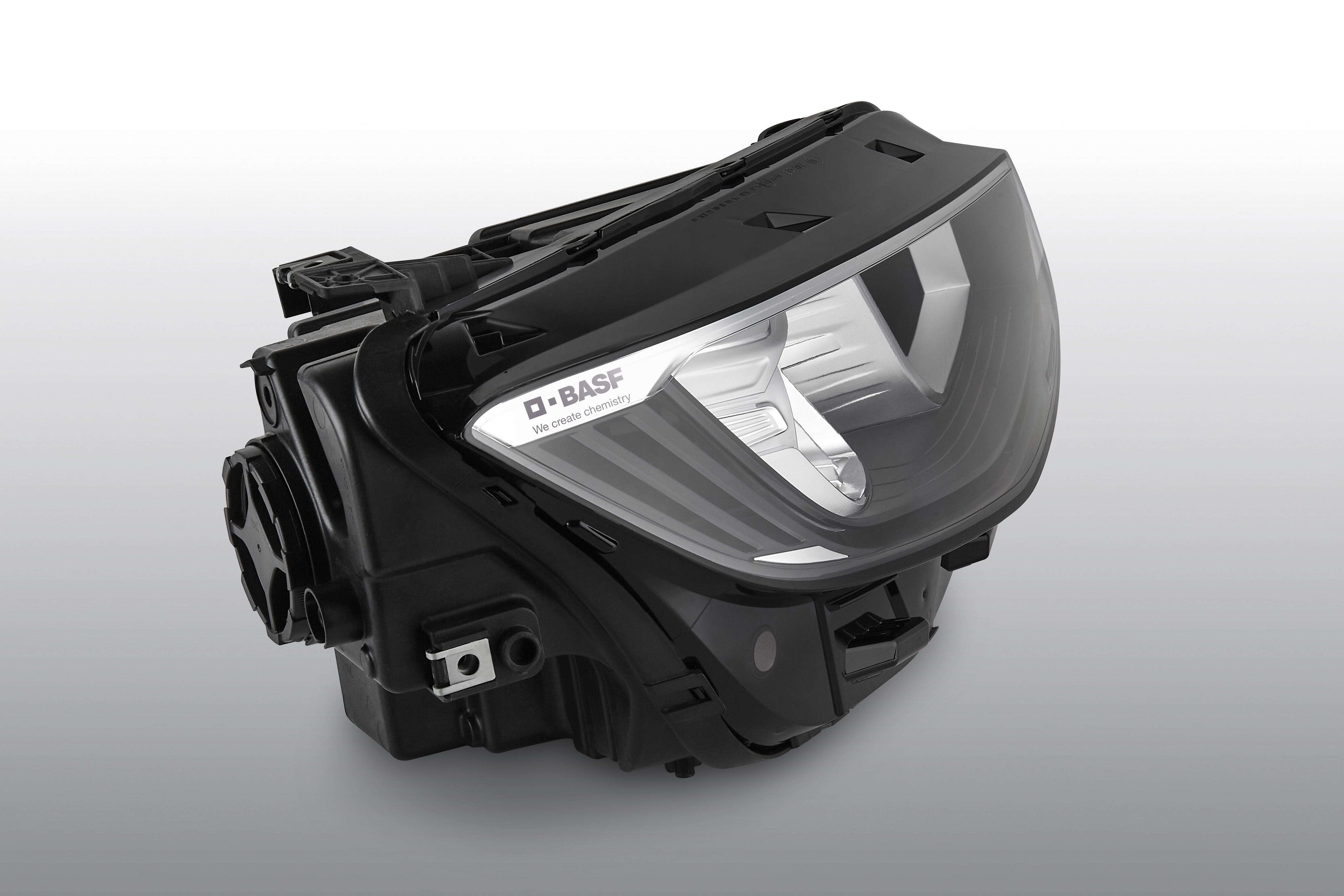 Caption - Enabling attractive branding on metallic lamp bezel surfaces of automotive headlamps with Ultradur®.jpg